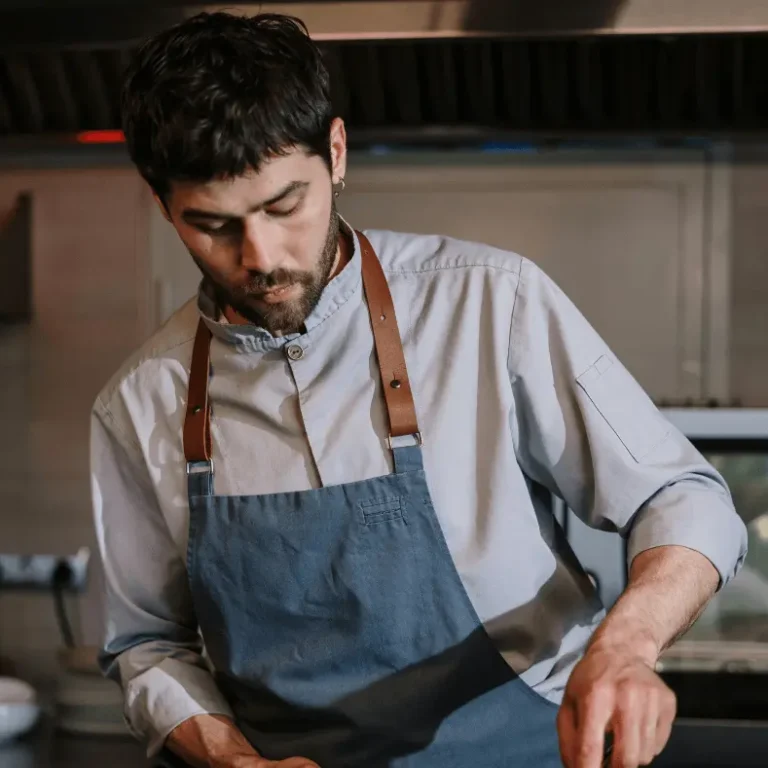 Grill chef in a restaurant kitchen